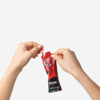 Hands tearing open a RocketFuel TRAIN gel