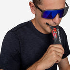 Athlete taking a RocketFuel RACE gel