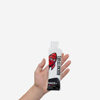 Open hand holding a RACE+ energy gel