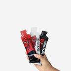 Hand holding TRAIN, RACE+ and RACE gels