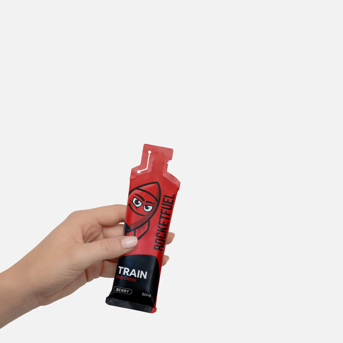 Hand holding a TRAIN energy gel